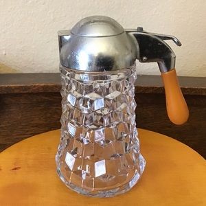 Vintage Fostoria crystal syrup bottle with Bakelite handle